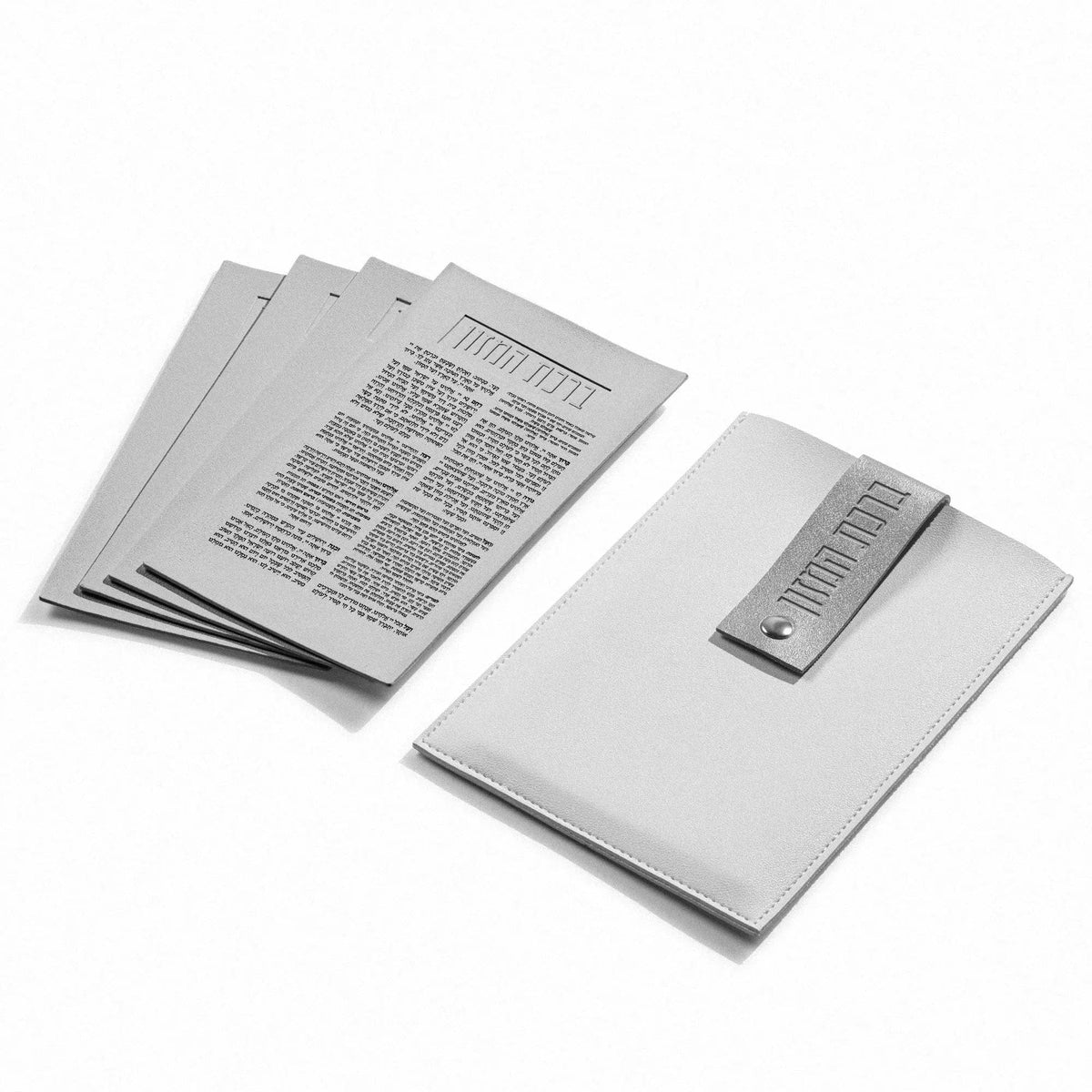 White bencher pouch with silver snap tab and four silver bencher cards