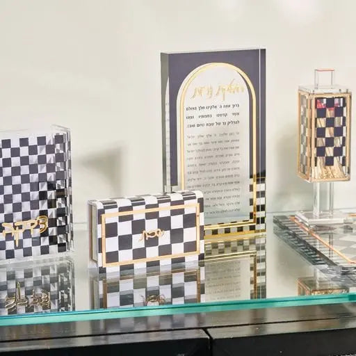 Onyx Hadlokas Neiros Block — detail view | Judaica Square Lakewood