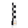 Onyx Havdalah Candle, a tall freestanding black and white checkered candle on a black base with embossed gold הבדלה lettering