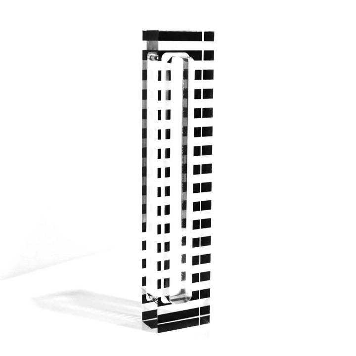 Black and white stripe Lucite mezuzah case on white background