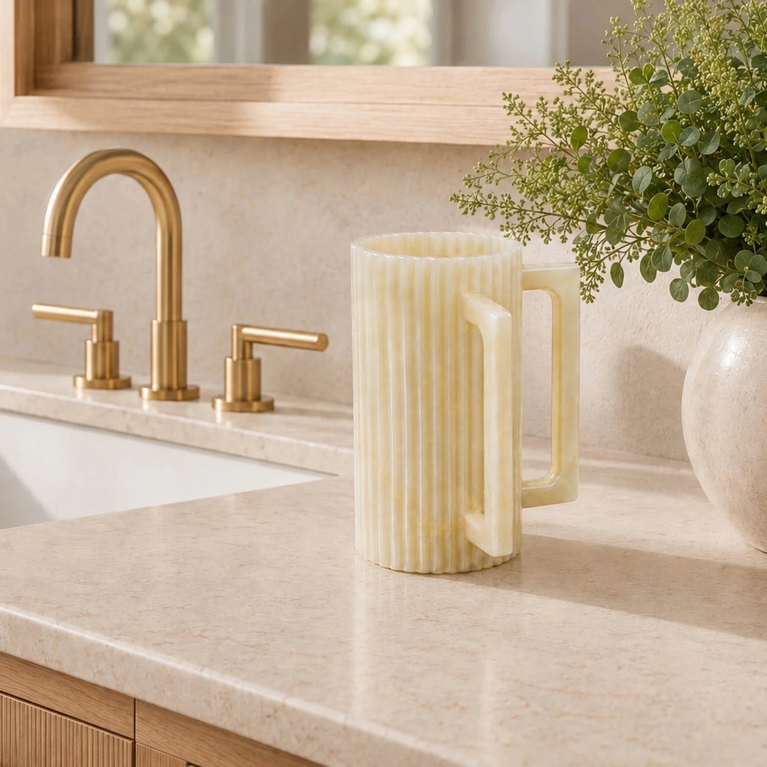 Marble finish Waterdale fluted resin washing cup displayed beside a sink