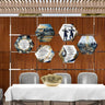 Six Waterdale painted hexagon Lucite sukkah panels arranged on a wooden wall