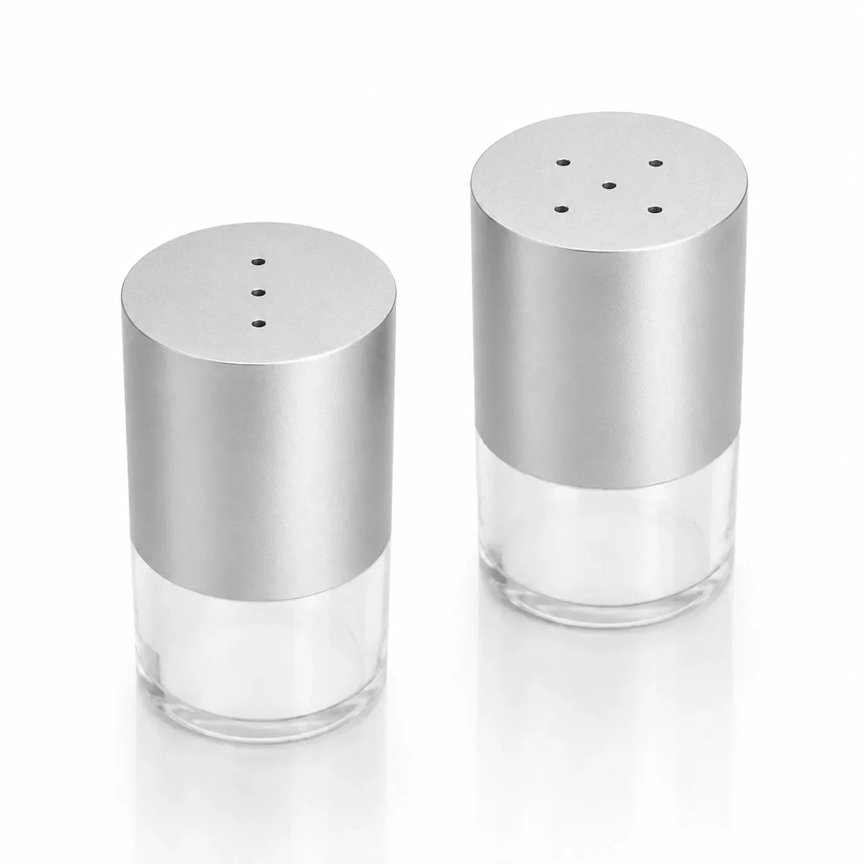 Silver Waterdale salt and pepper shaker pair with clear acrylic bases, studio view