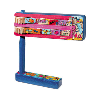 Yair Emanuel painted wooden grogger and matching stand with a colorful Mordechai scene
